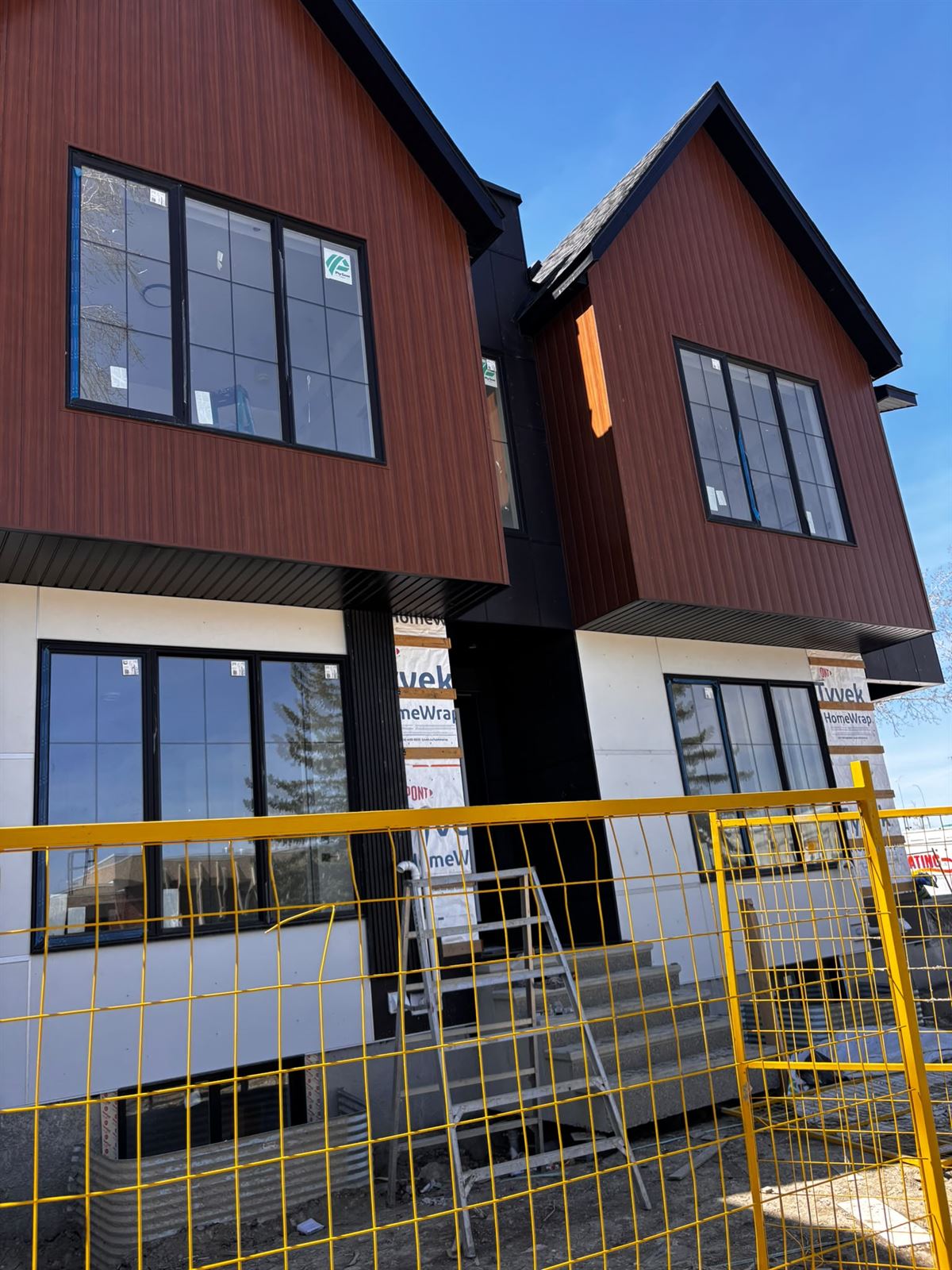 Townhome row taking shape with new siding going on