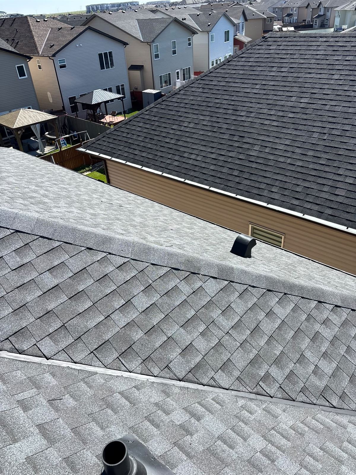 New shingles across intersecting roof valleys