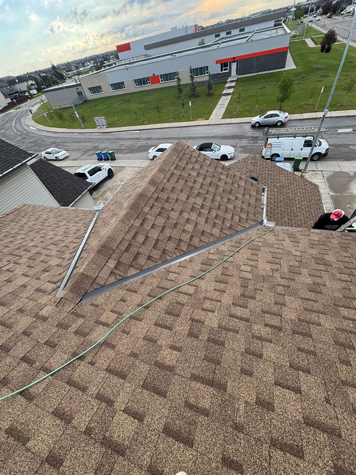 Silverstone van parked below a finished roofing project